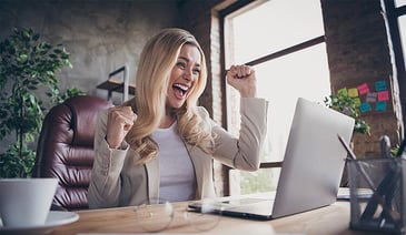 Photo of cheerful screaming entrepreneur seeing her corporation having taken first place in many charts